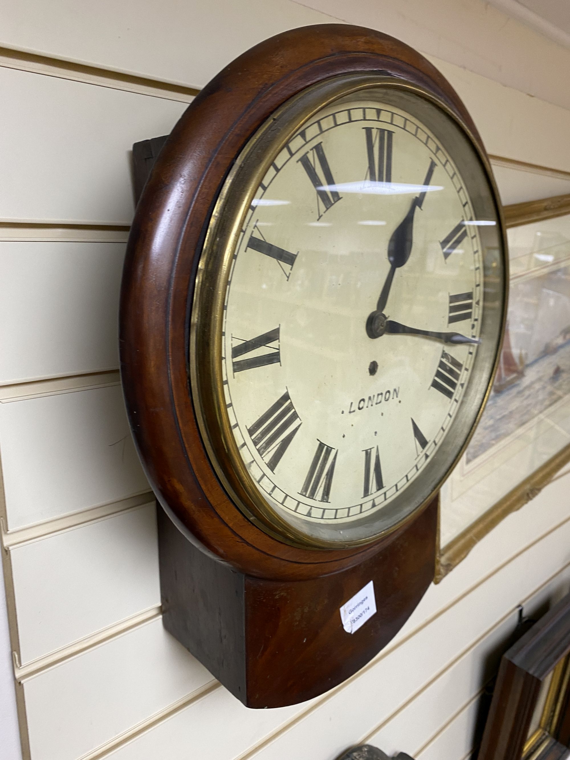 A mahogany drop dial wall clock with single fusee, height 47cm